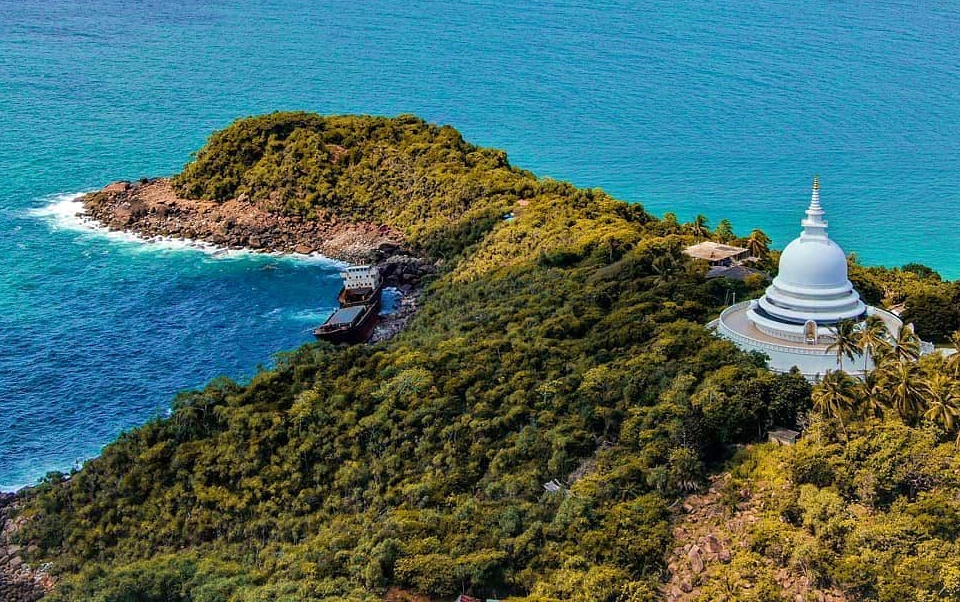 Exploring the Mythical Rumassala Hill: Nature Walks and Peace Pagoda Views