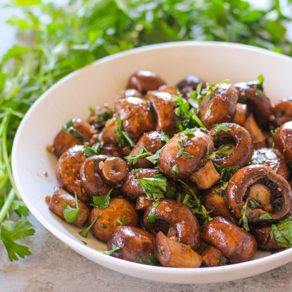 Fried mushrooms, often cooked in a little butter, are an essential component.